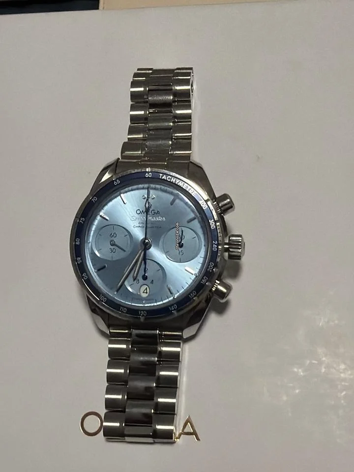 Omega Speedmaster Chronograph 38 Co-axial Box and Papers included.