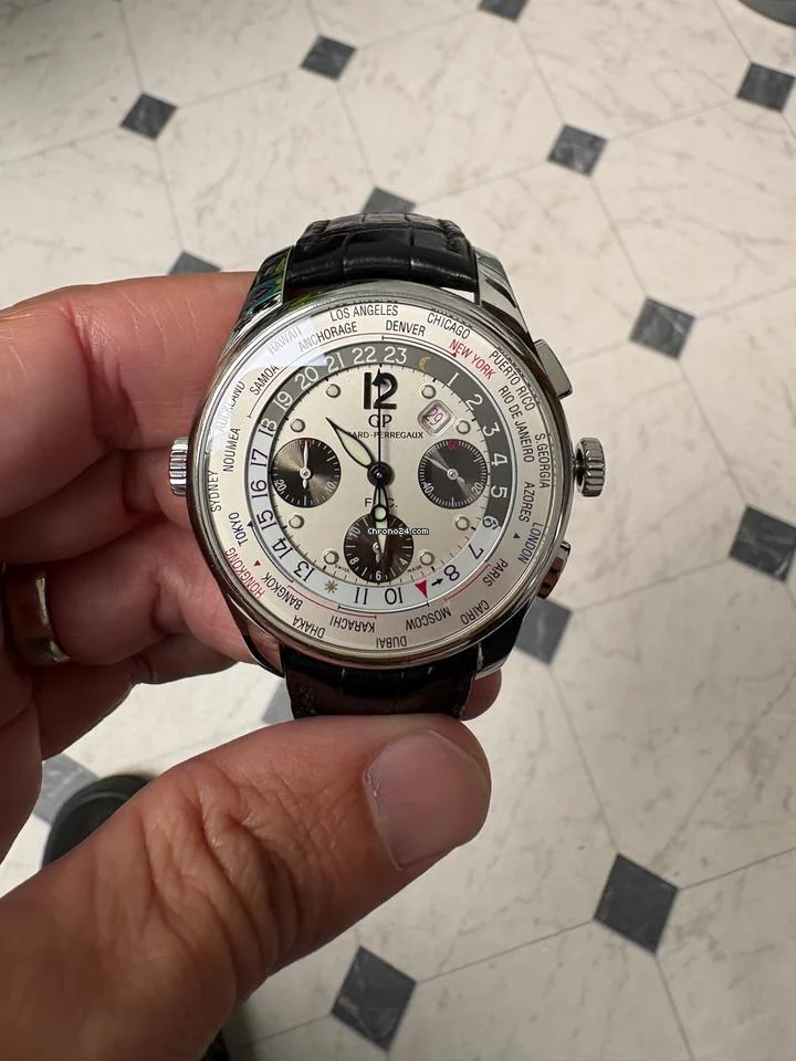 Girard Perregaux World Original owner, with box, card, and full paperwork