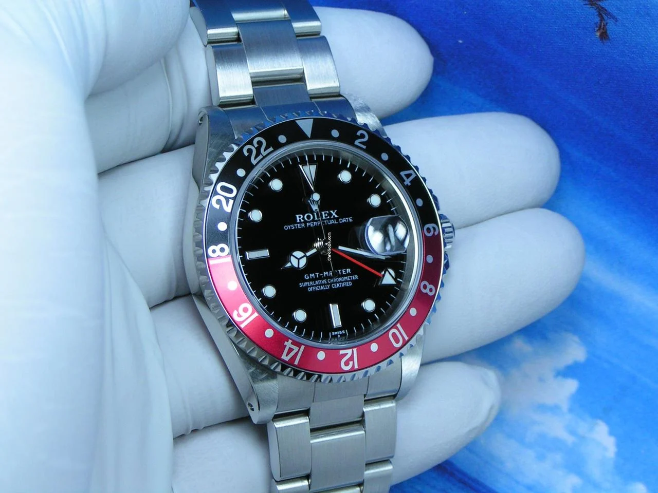 Rolex 1998 GMT-Master NOS with STICKERS Boxes Papers Black Dial Black-Red Coke Bezel 16700