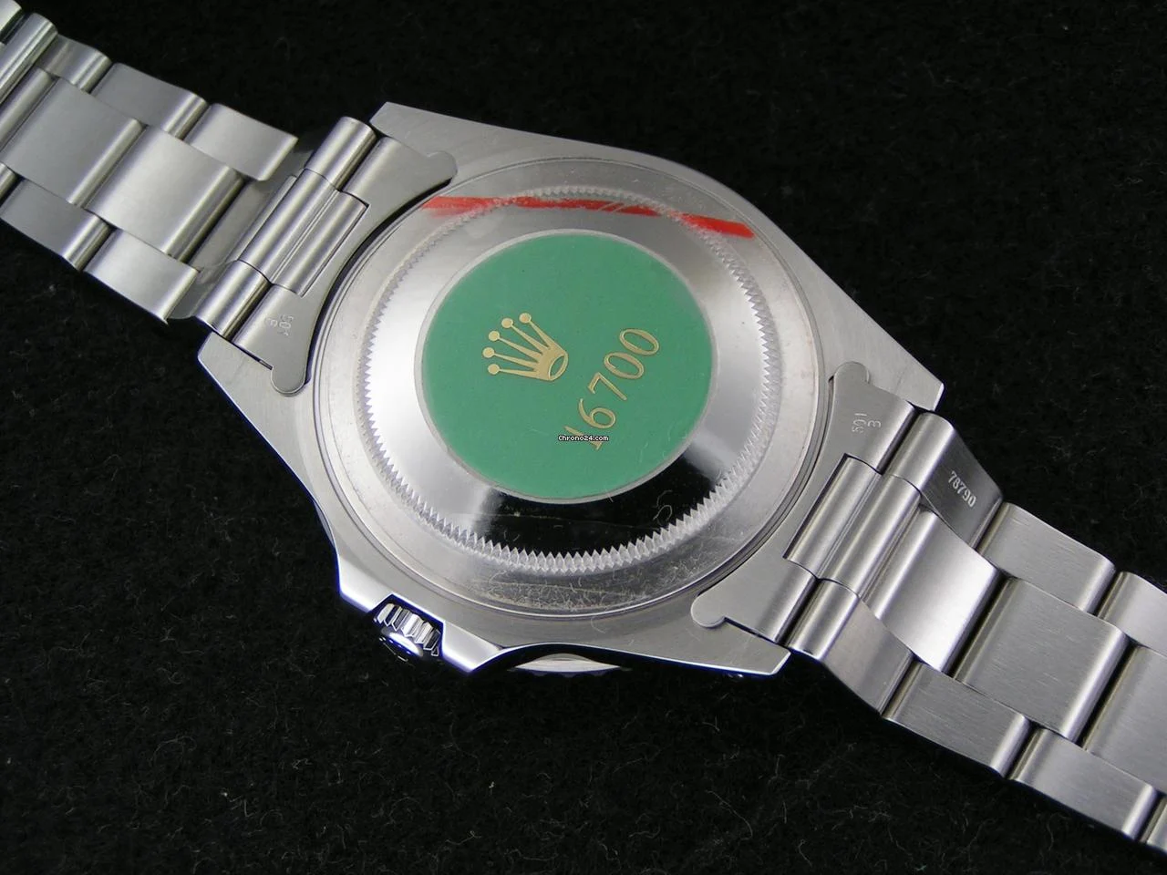 Rolex 1998 GMT-Master NOS with STICKERS Boxes Papers Black Dial Black-Red Coke Bezel 16700