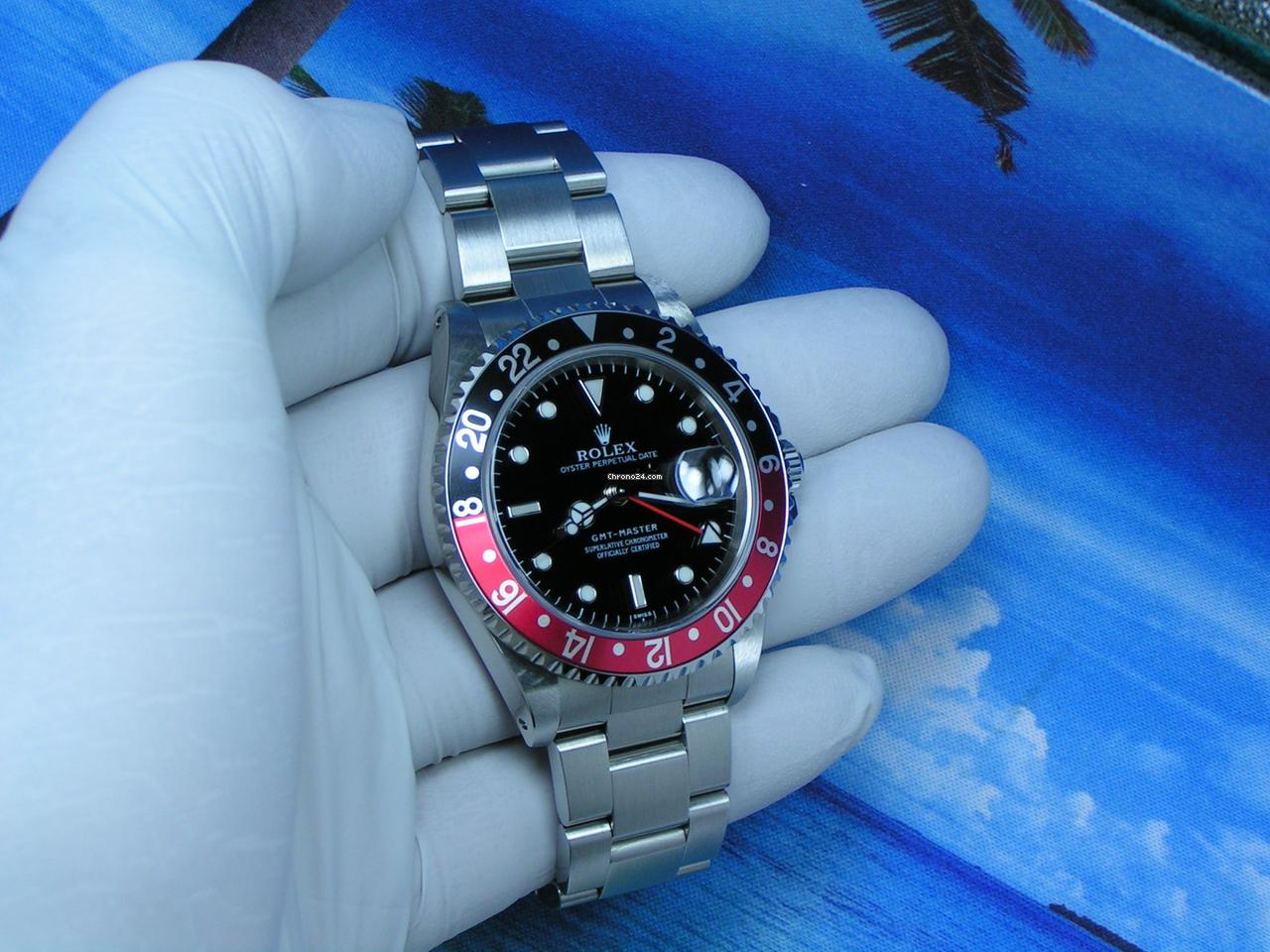 Rolex 1998 GMT-Master NOS with STICKERS Boxes Papers Black Dial Black-Red Coke Bezel 16700