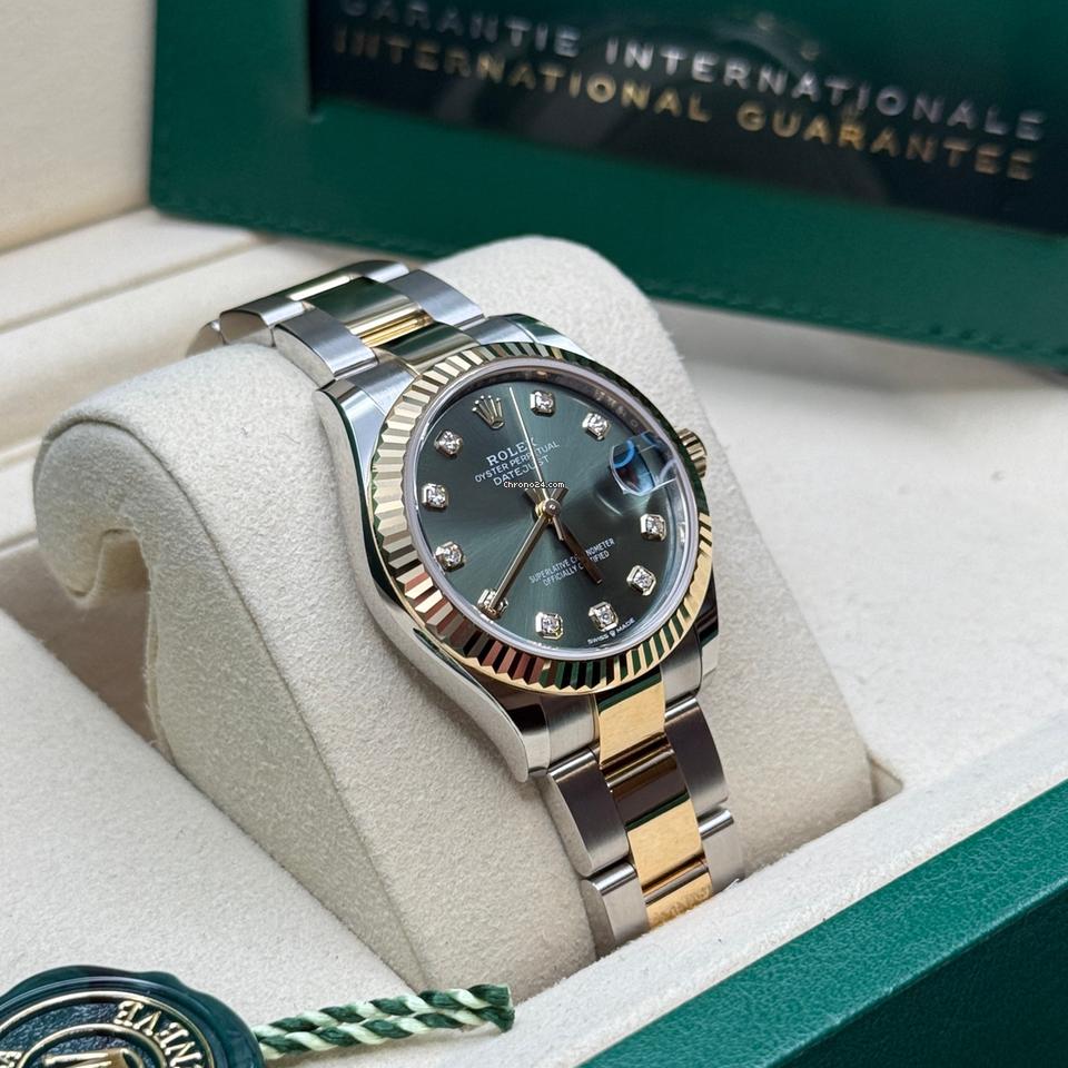 Rolex Datejust 31 Green Diamond Dial Two Tone Yellow Gold Fluted Bezel Oyster Bracelet